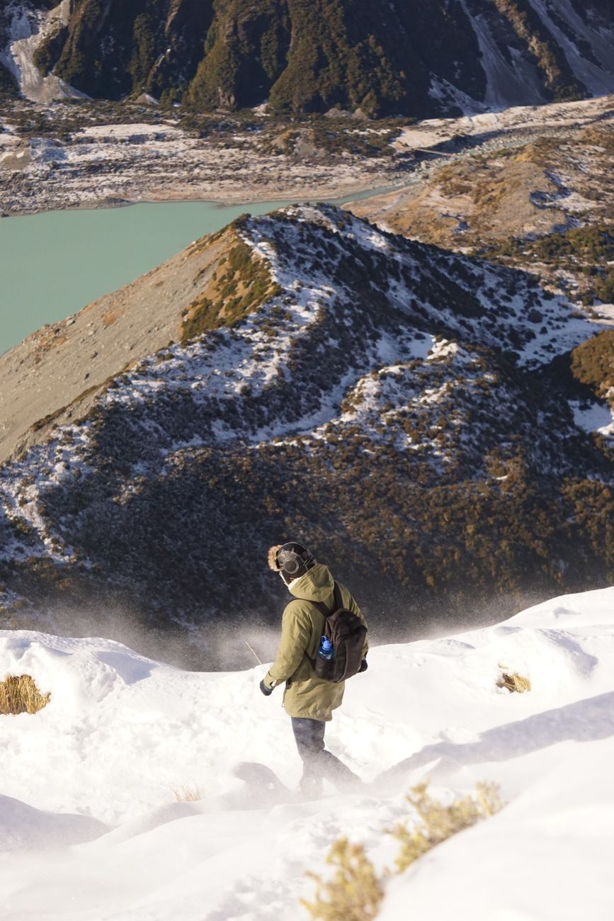 Traveler looking over Mount Cook Aoraki view